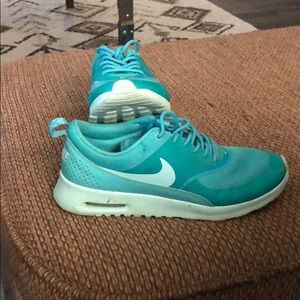 Teal Nike air max Thea running shoes.